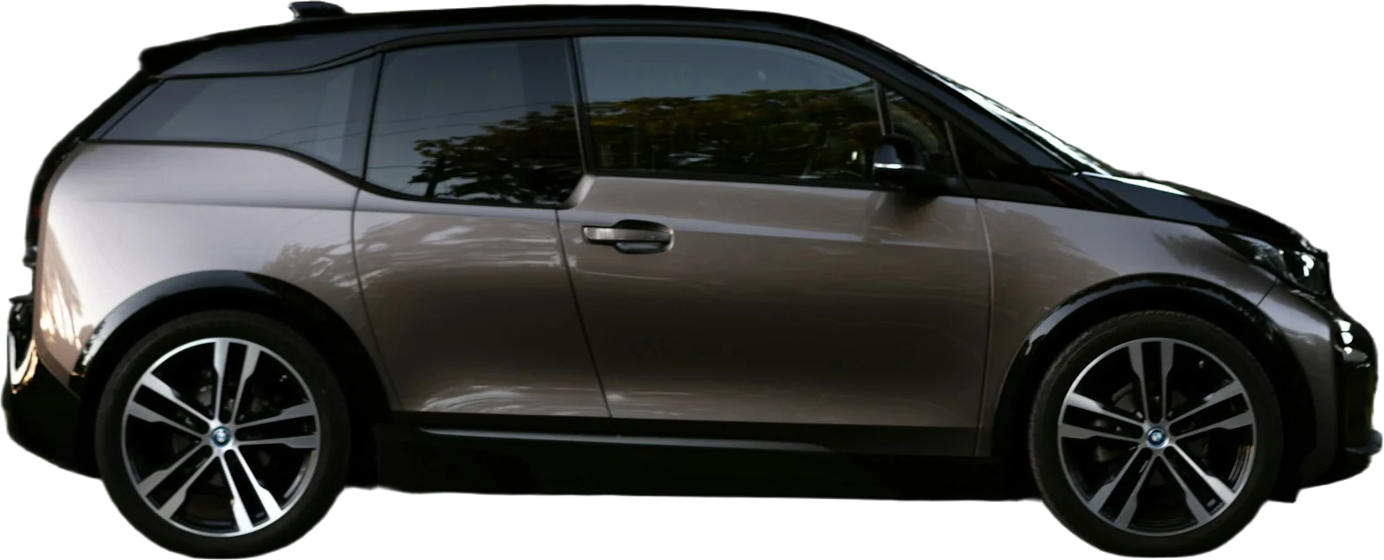 Bronze compact electric hatchback, side view